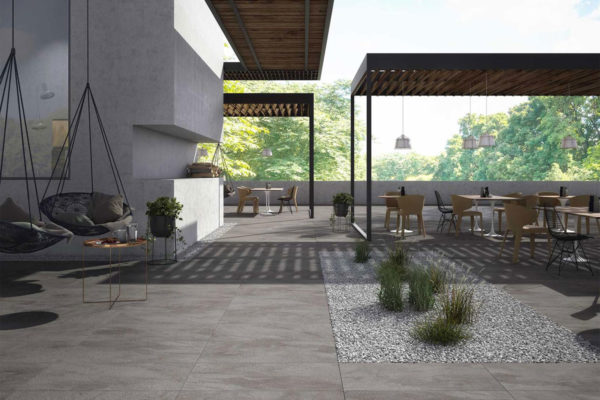 outside dinning & lounge area with a feature garden