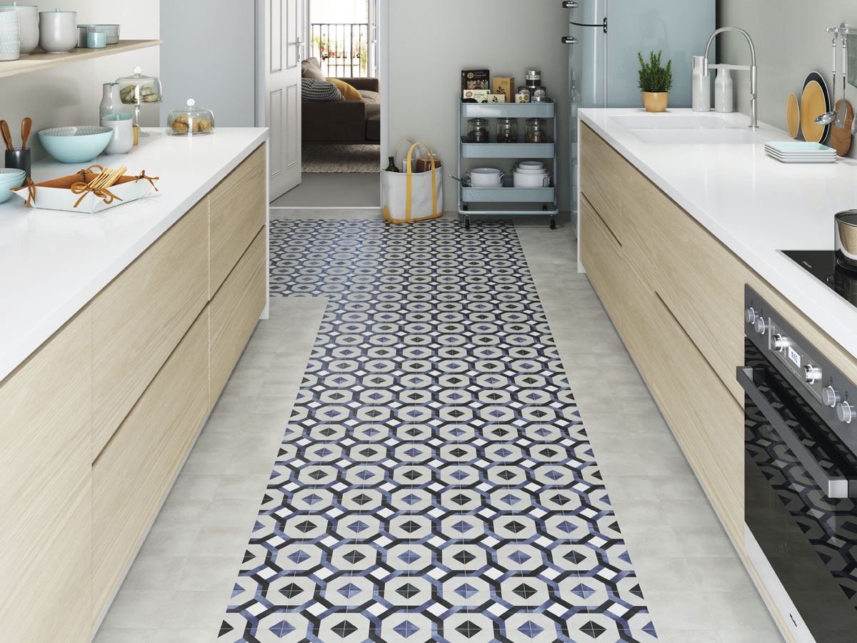 contemporary kitchen with a patterned tiled walk away