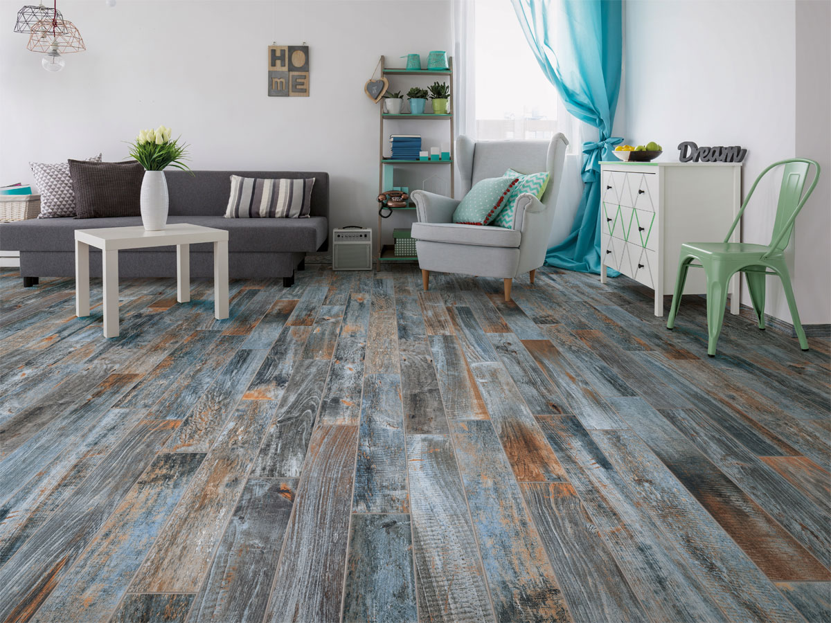 Unique blue coloured wood effect flooring in a contemporary living room