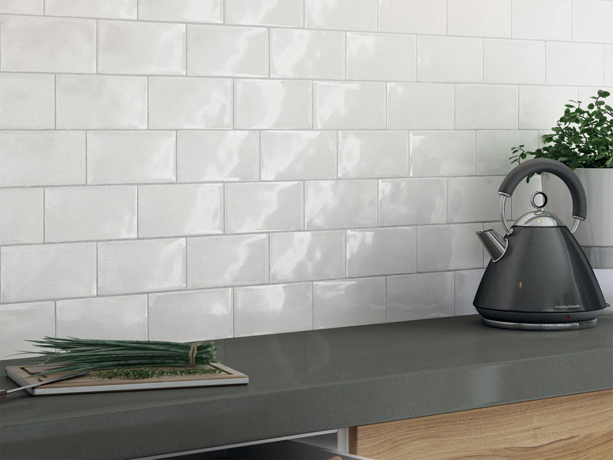 contemporary kitchen with crackle glazed tiles as a splash back