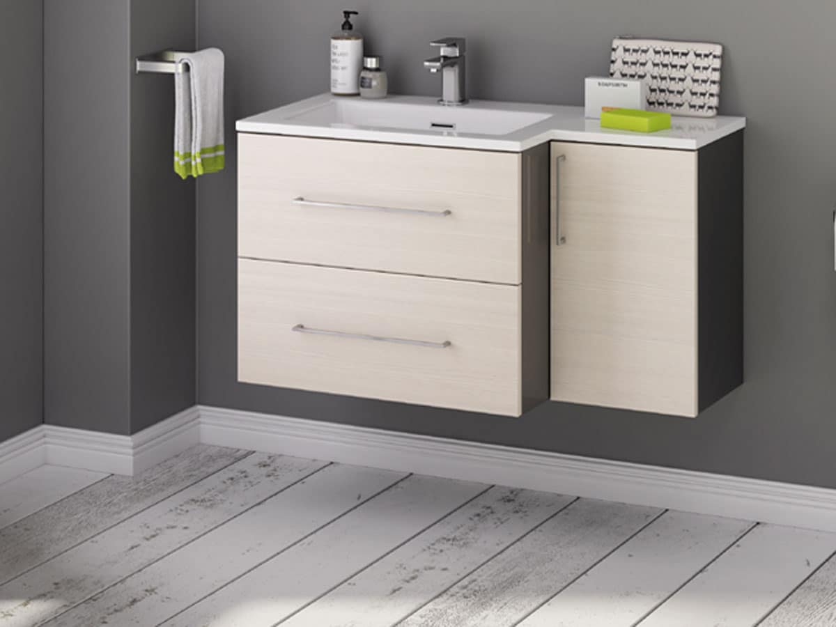 a unique wall hung basin unit with a recessed storage cupboard