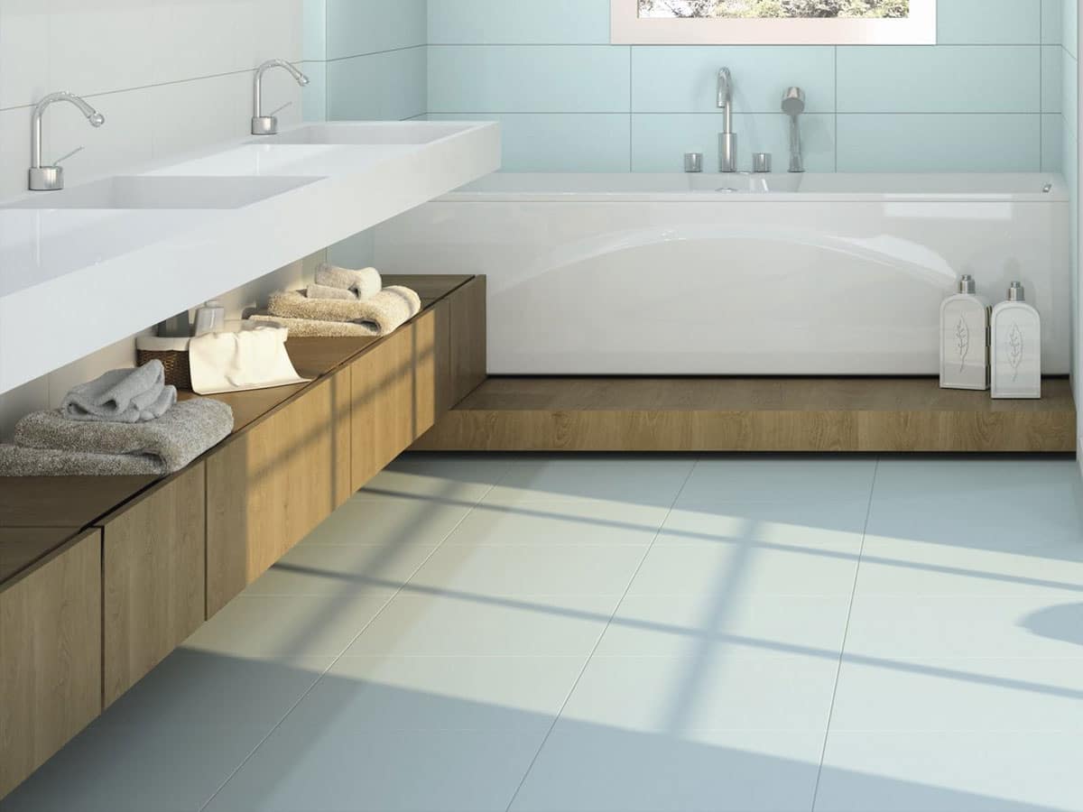 modern bathroom with floating basins and a bath raised up on a plinth